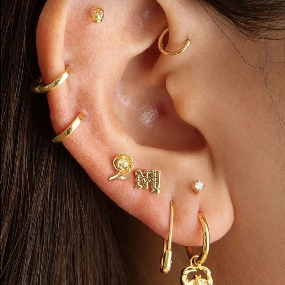 Gold paper clip earring